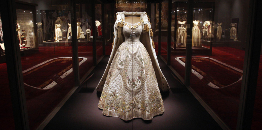 The Dress worn by Queen Elizabeth II at her Coronation was designed by Norman Hartnell