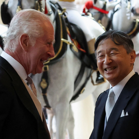King Charles III laughs with Emperor Naruhito