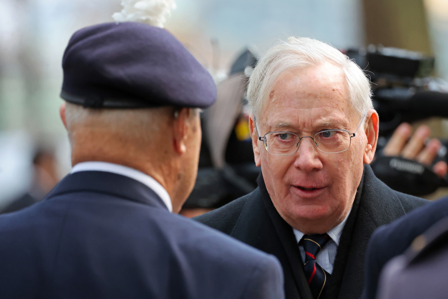 The Duke of Gloucester speaks to a veteran