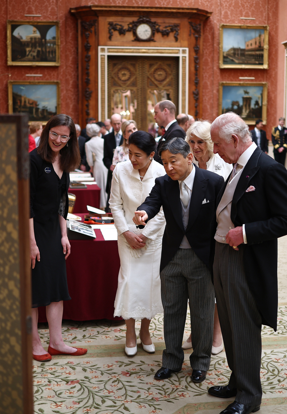 King Charles III and Queen Camilla with Emperor Naruhito and his wife Empress Masako of Japan, view a display of Japanese items from the Royal Collection at Buckingham Palace